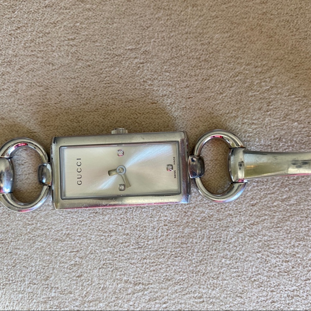 Gucci watch.